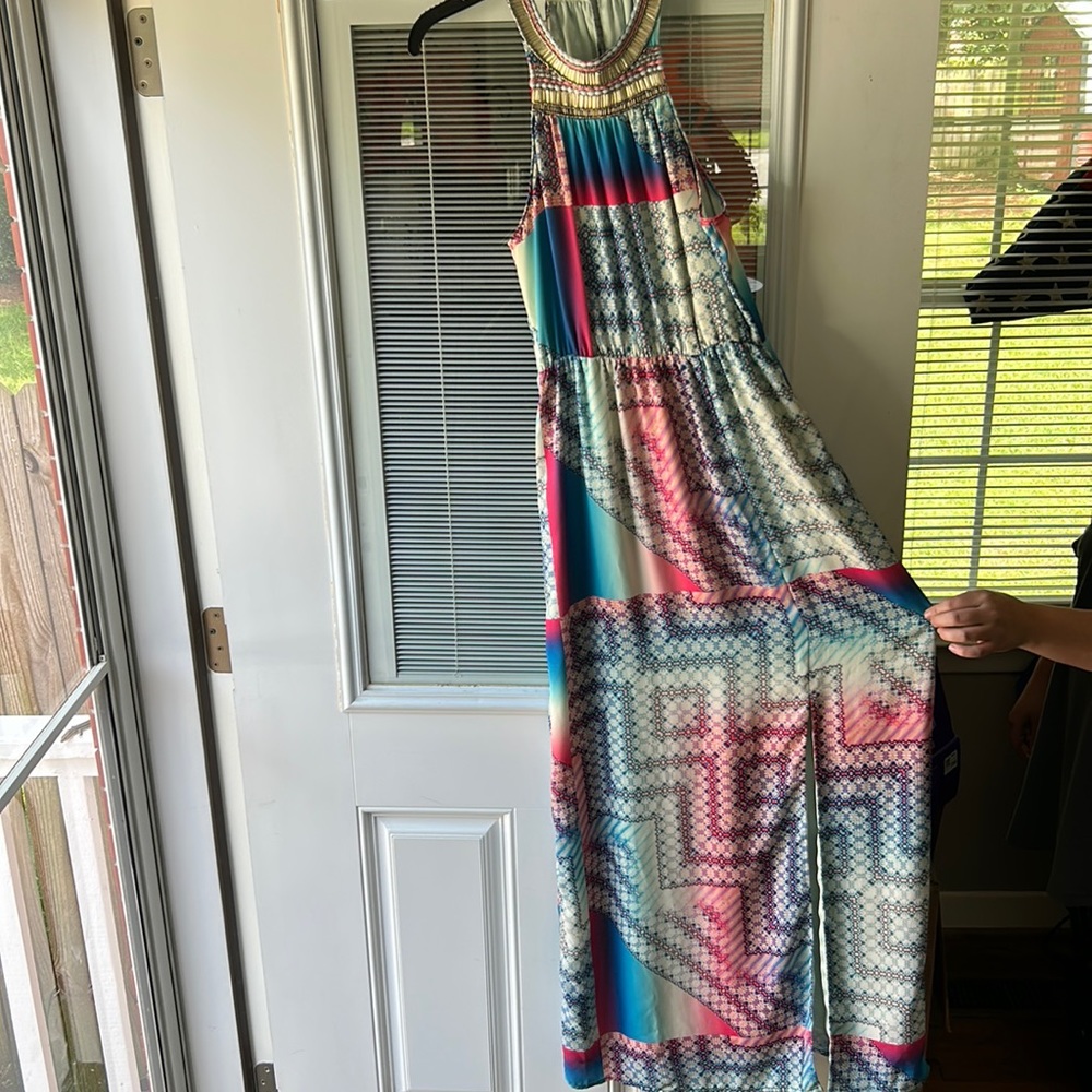 Floor length dress with split an abstract, art, and beaded neckline